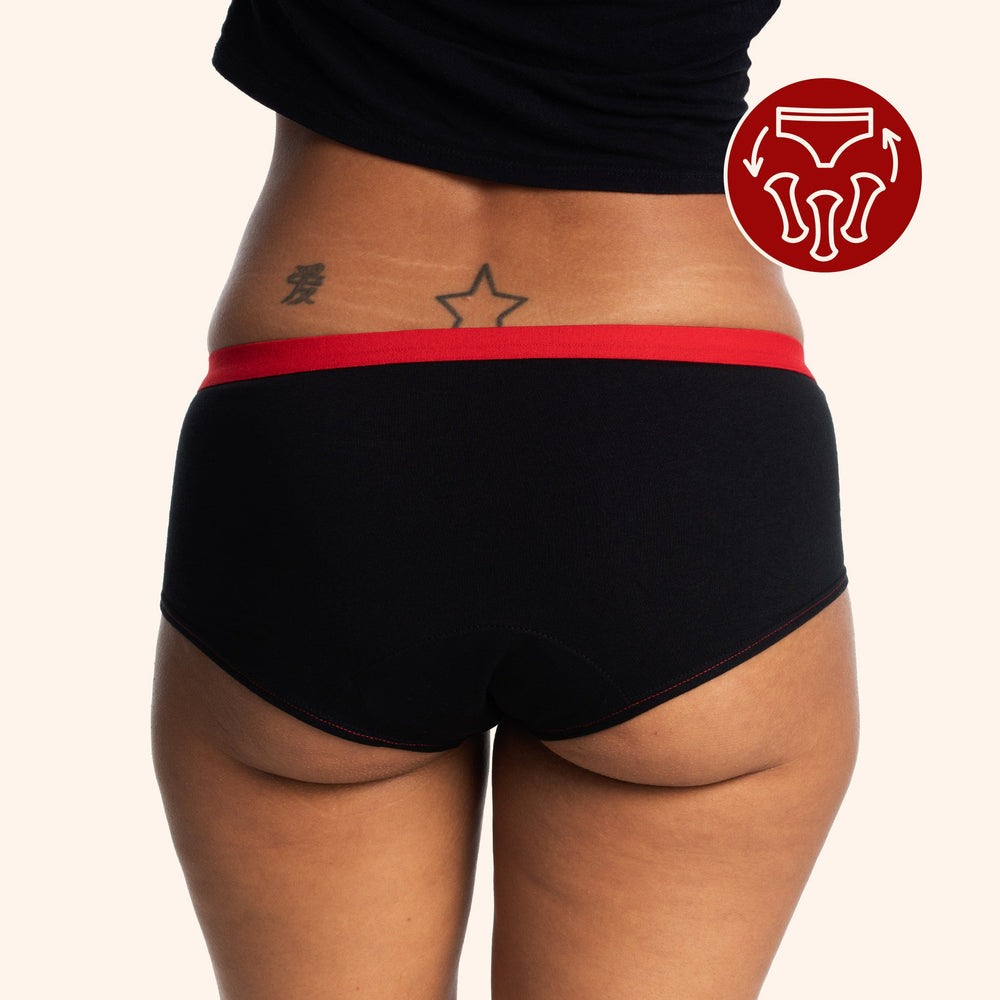 Femme de dos qui porte une culotte shorty.